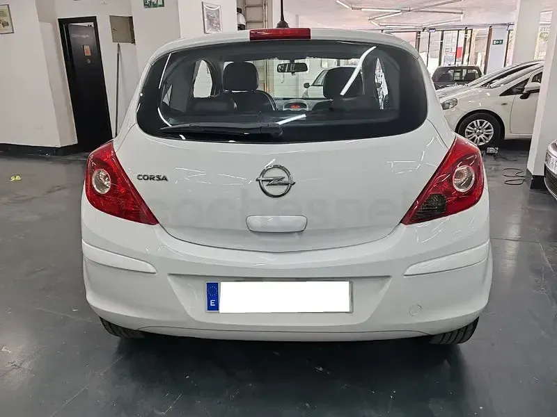 Usado Opel Corsa Expression 85 CV (62 kW) 2012 Blanco Utilitario