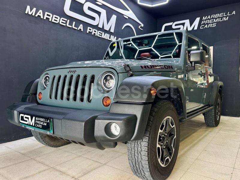 Gris / plata Usado 2013 Jeep Wrangler Unlimited Rubicon SUV | 36.990 € (Precio justo) - Imagen 1/4