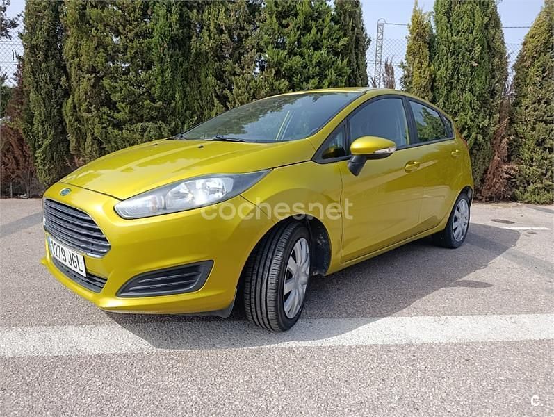 Amarillo Usado 2015 Ford Fiesta Trend Utilitario | 7200 € (Buen precio) - Imagen 1/4