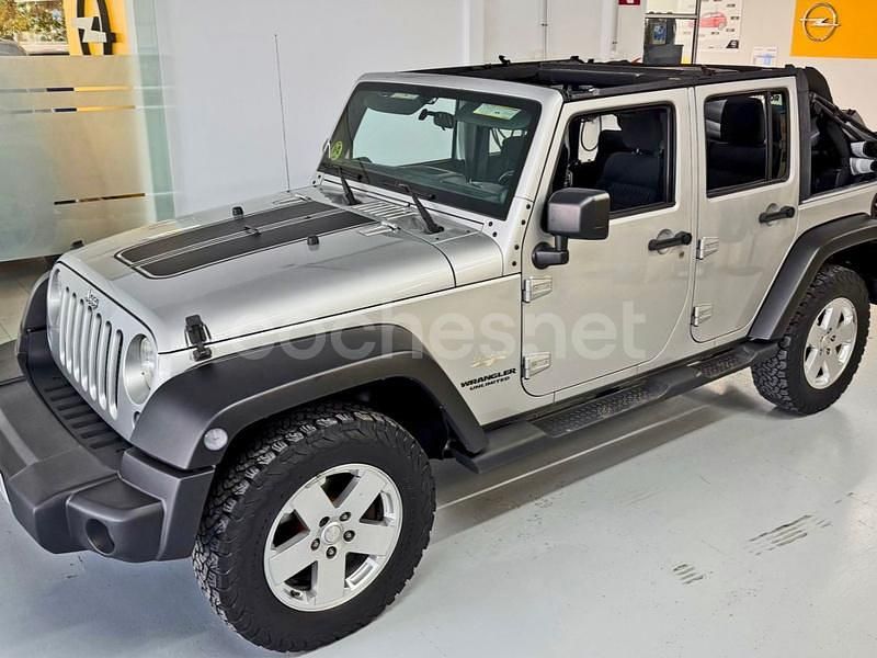 Gris / plata Usado 2011 Jeep Wrangler Unlimited Sahara SUV | 27.500 € (Precio justo) - Imagen 1/4