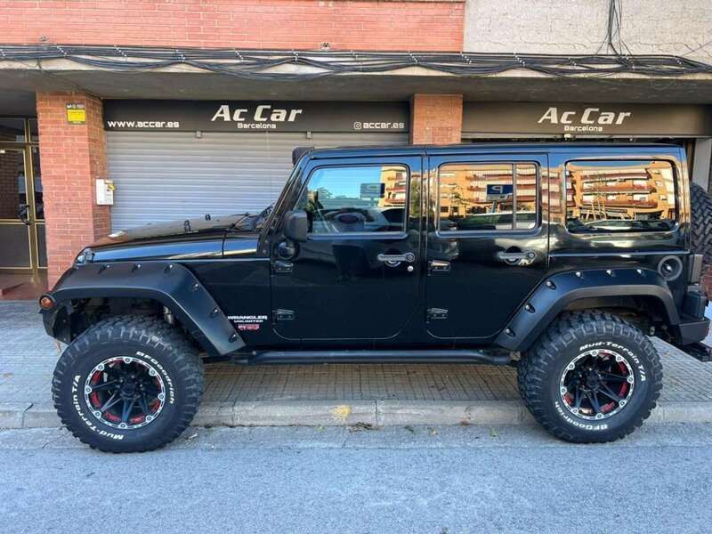 Negro Usado 2011 Jeep Wrangler Unlimited Sahara SUV | 35.500 € - Imagen 1/4