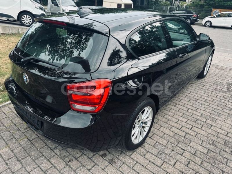 Negro Usado 2013 BMW 116 Comfort Edition Utilitario | 9950 € (Buen precio) - Imagen 1/4