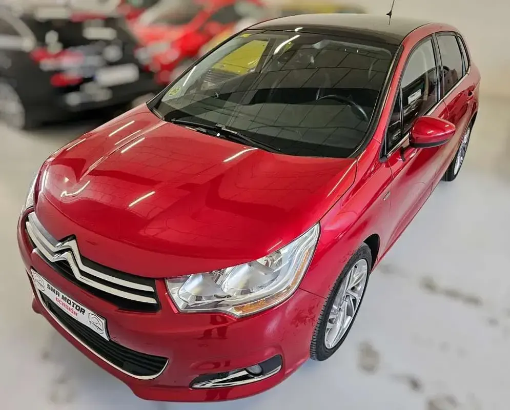 Usado Citroën C4 Exclusive 114 CV (83 kW) 2013 Rojo Utilitario