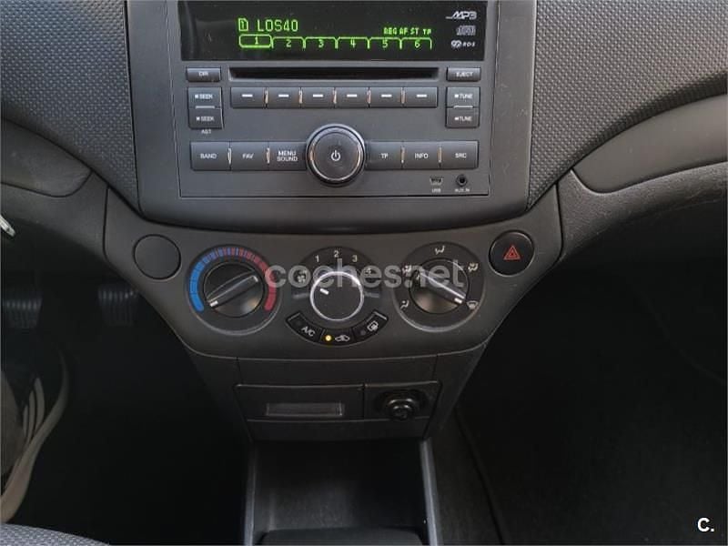 Usado Chevrolet Aveo LS 84 CV (61 kW) 2011 Rojo Berlina