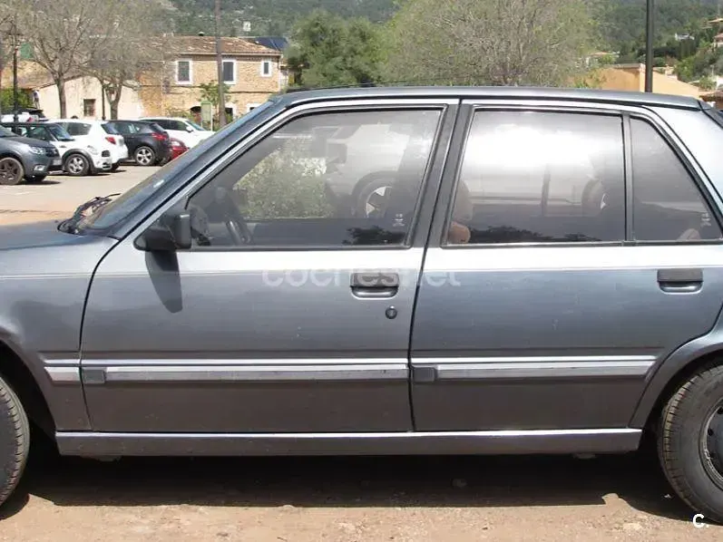 Usado Peugeot 309 94 CV (69 kW) 1991 Gris / plata Utilitario