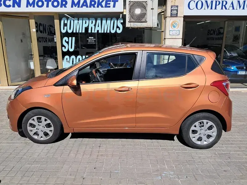 Usado Hyundai i10 66 CV (48 kW) 2014 Naranja Utilitario