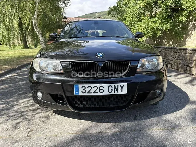 Usado BMW 116 115 CV (84 kW) 2009 Negro Utilitario
