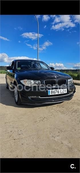 Usado BMW 118 122 CV (89 kW) 2007 Negro Utilitario