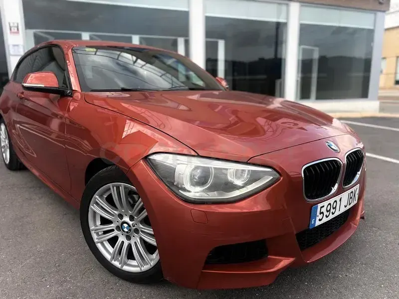 Usado BMW 116 116 CV (85 kW) 2015 Naranja Utilitario