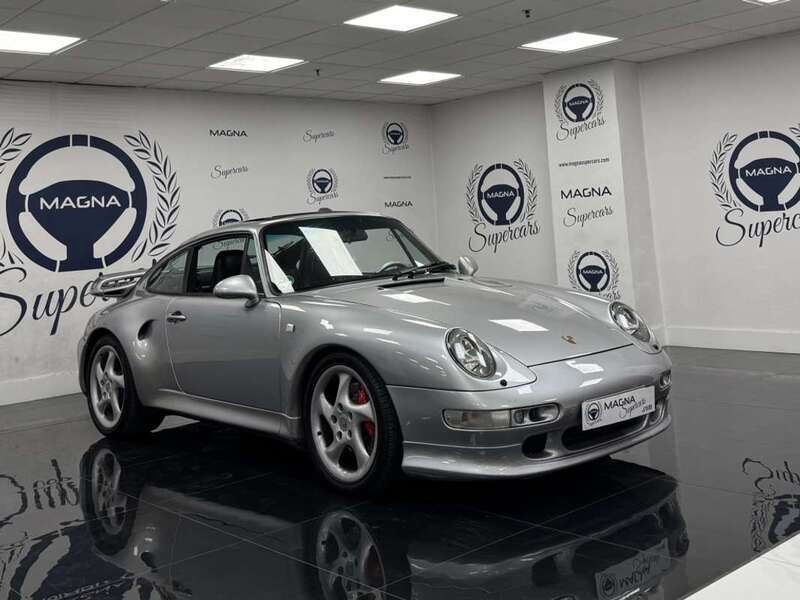 Gris Usado 1996 Porsche 911 Carrera 4S Coupe | 129.900 € - Imagen 1/4
