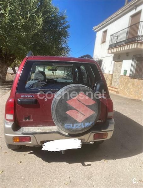 Usado Suzuki Grand Vitara 110 CV (80 kW) 2002 Granate SUV