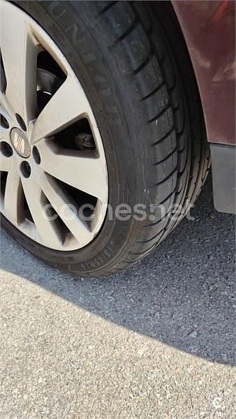 Usado Seat Toledo Style 105 CV (77 kW) 2013 Granate Utilitario