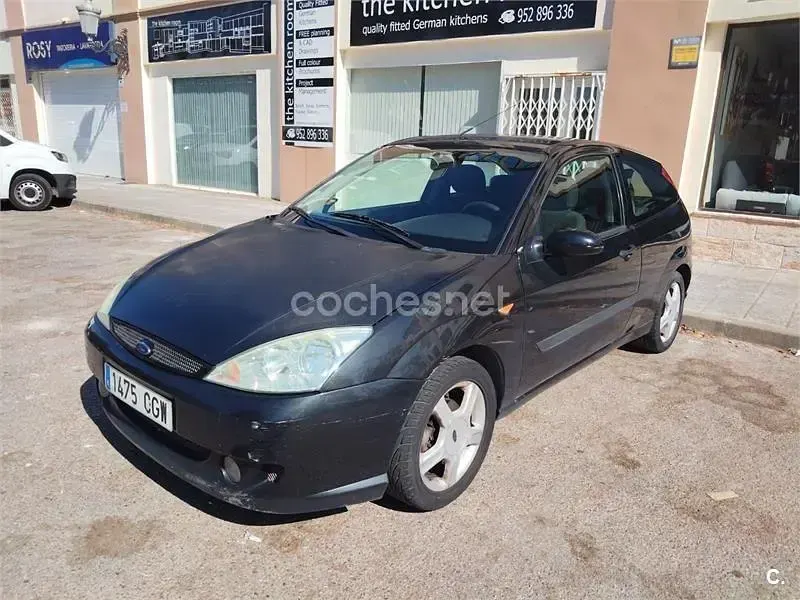 Usado Ford Focus Trend 100 CV (73 kW) 2003 Negro Berlina