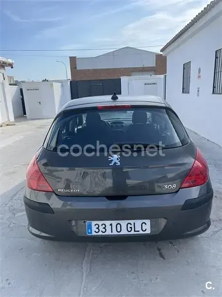 Usado Peugeot 308 90 CV (66 kW) 2009 Gris / plata Berlina