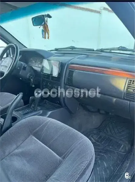 Usado Jeep Grand Cherokee Laredo 140 CV (102 kW) 1999 Azul SUV