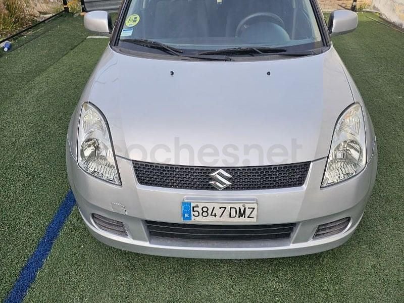 Usado Suzuki Swift GL 92 CV (67 kW) 2005 Gris / plata Utilitario