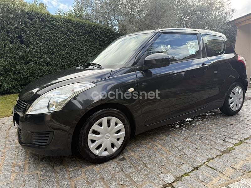 Usado Suzuki Swift 95 CV (69 kW) 2011 Negro Berlina
