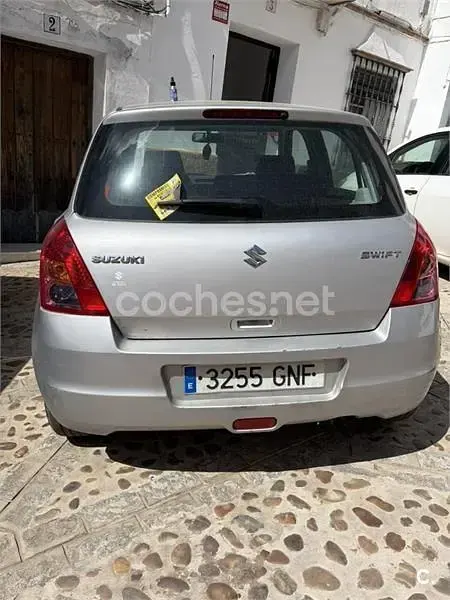 Usado Suzuki Swift GLX 92 CV (67 kW) 2009 Gris / plata Utilitario