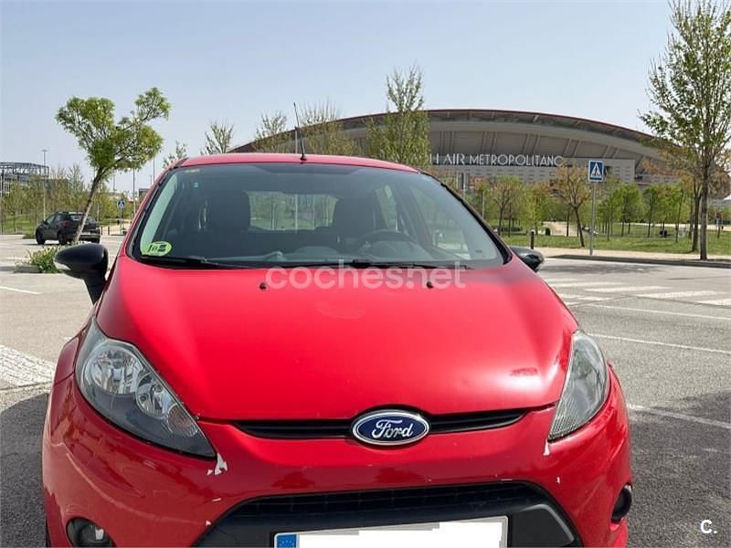 Usado Ford Fiesta Trend 95 CV (69 kW) 2010 Rojo Utilitario