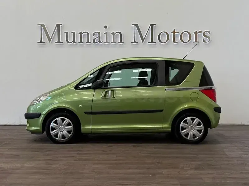 Usado Peugeot 1007 110 CV (80 kW) 2006 Verde Monovolumen