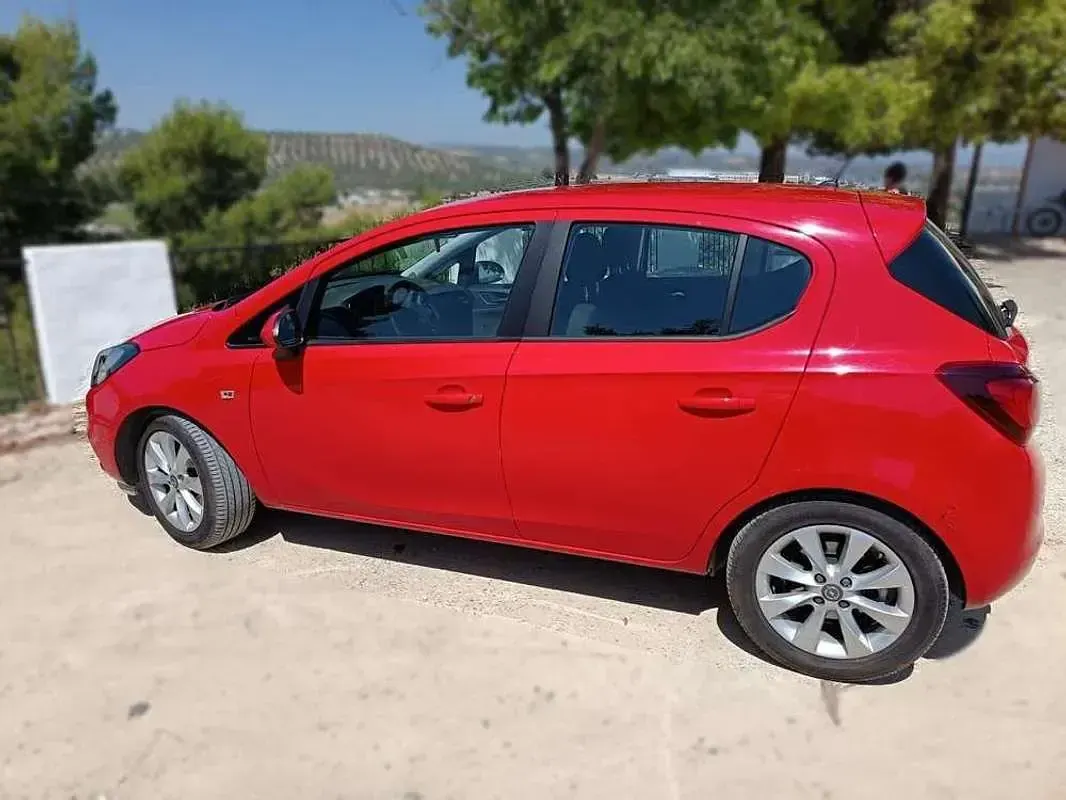 Usado Opel Corsa Selective 95 CV (69 kW) 2016 Rojo Utilitario