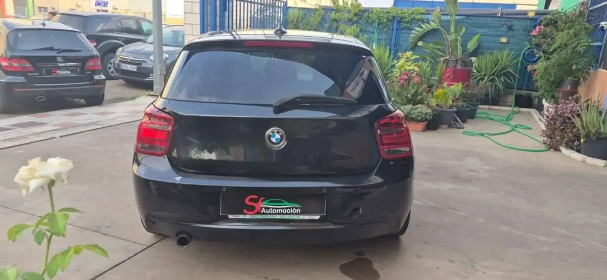 Usado BMW 116 116 CV (85 kW) 2012 Negro Utilitario