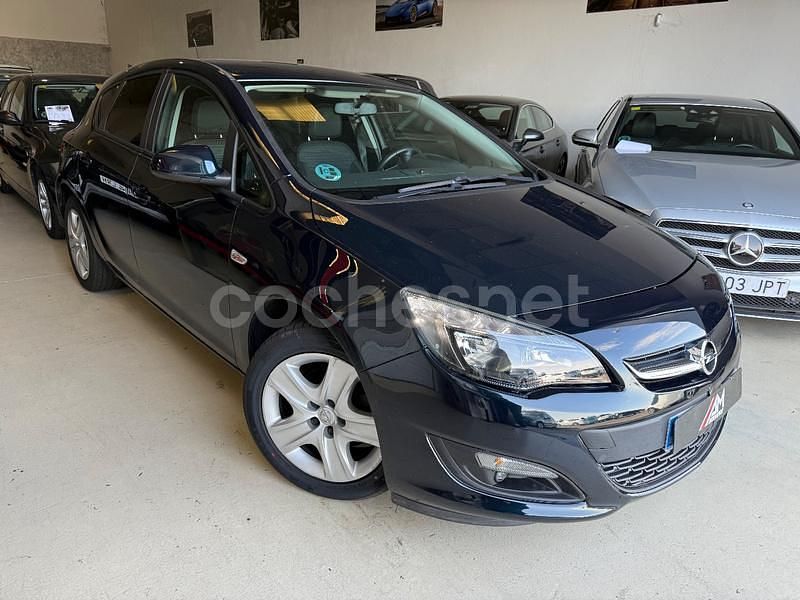 Używany Opel Astra Selective 110 KM (80 kW) 2015 Zielony Sedan/Limuzyna