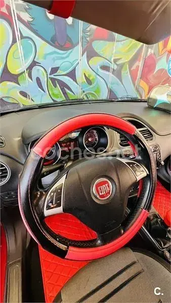 Usado Fiat Punto Evo Dynamic 95 CV (69 kW) 2011 Granate Utilitario