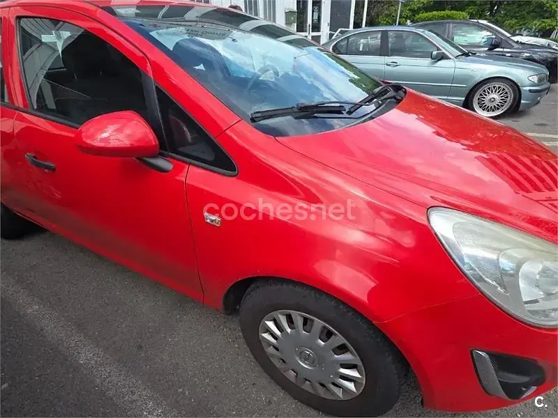 Usado Opel Corsa Selective 75 HP (55 kW) 2011 Vermelho Citadino