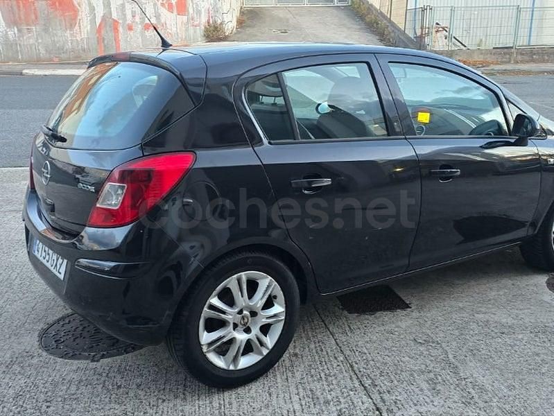 Usado Opel Corsa 90 CV (66 kW) 2010 Negro Utilitario