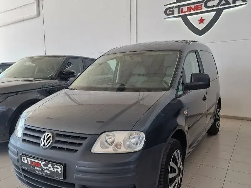 Usado VW Caddy 105 CV (77 kW) 2009 Gris / plata Monovolumen