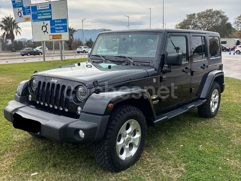 Negro Usado 2015 Jeep Wrangler Unlimited Sahara SUV | 34.900 € (Precio justo) - Imagen 1/4