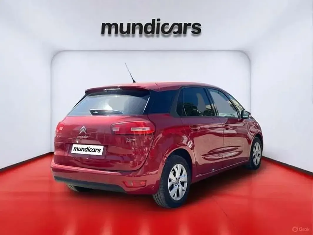 Usado Citroën C4 Seduction 114 CV (83 kW) 2014 Rojo Utilitario