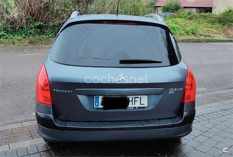Usado Peugeot 308 SW Access 112 CV (82 kW) 2011 Gris / plata Familiar