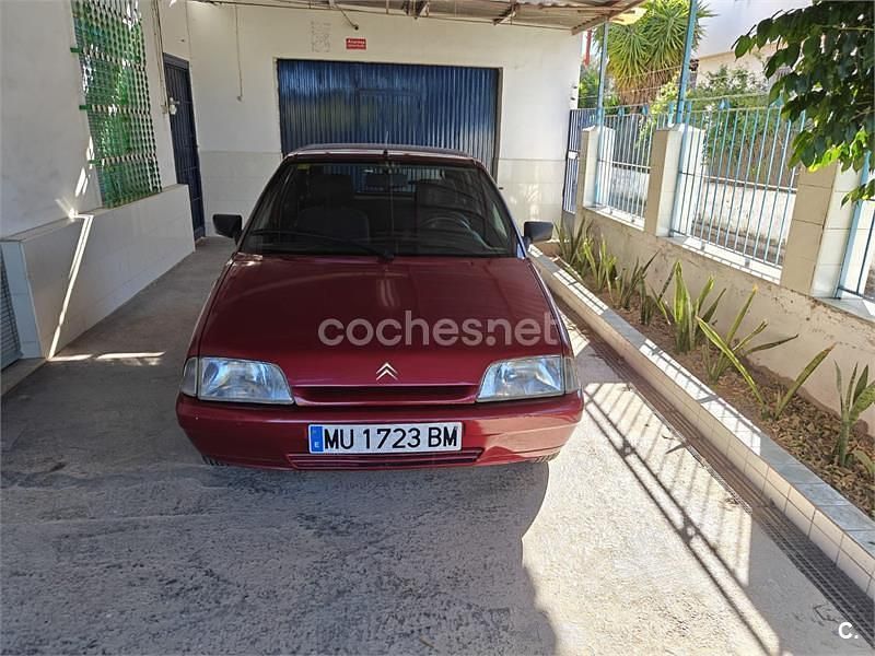 Usado Citroën AX Tonic 58 CV (42 kW) 1996 Granate Utilitario