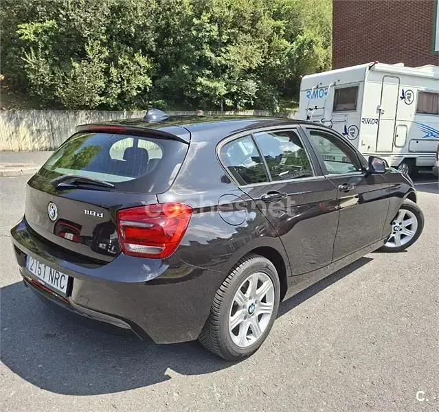 Usado BMW 118 143 CV (105 kW) 2013 Negro Utilitario