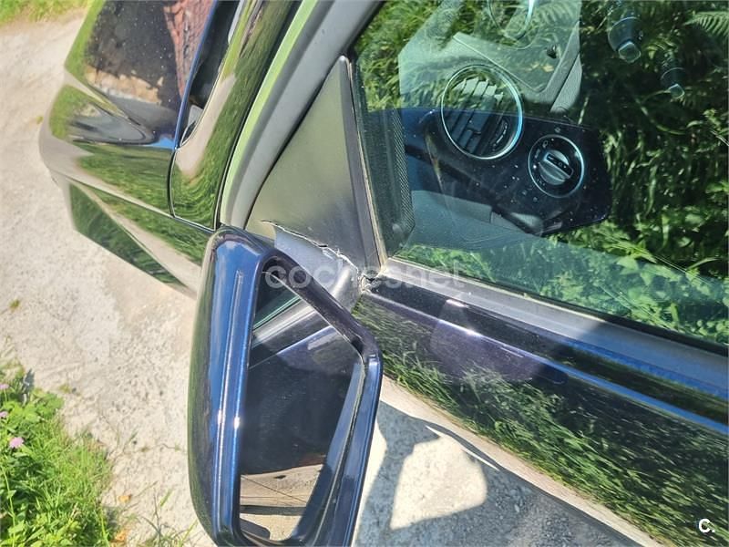 Usado Mercedes C200 136 CV (100 kW) 2012 Azul Familiar