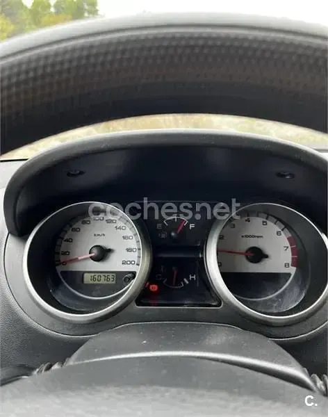 Usado Suzuki Ignis 99 CV (72 kW) 2004 Gris / plata Utilitario