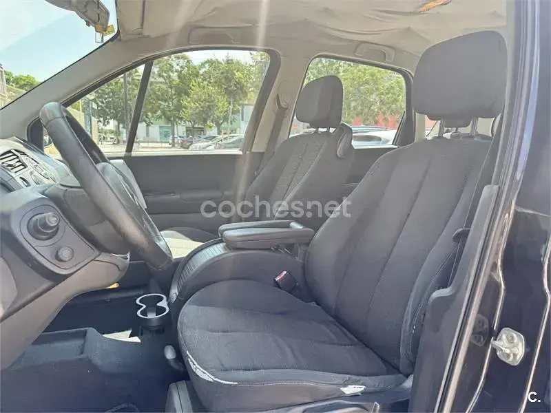 Usado Renault Scénic II 105 CV (77 kW) 2007 Negro Monovolumen