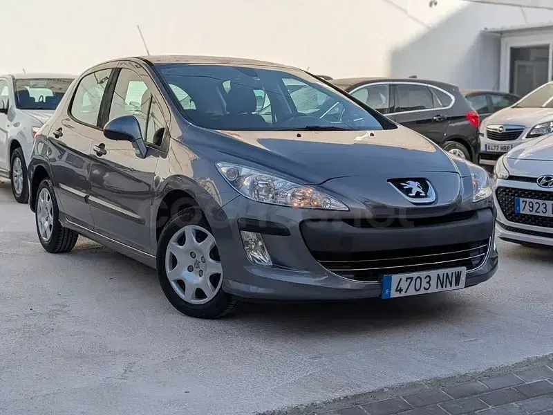 Usado Peugeot 308 95 CV (69 kW) 2010 Gris / plata Berlina