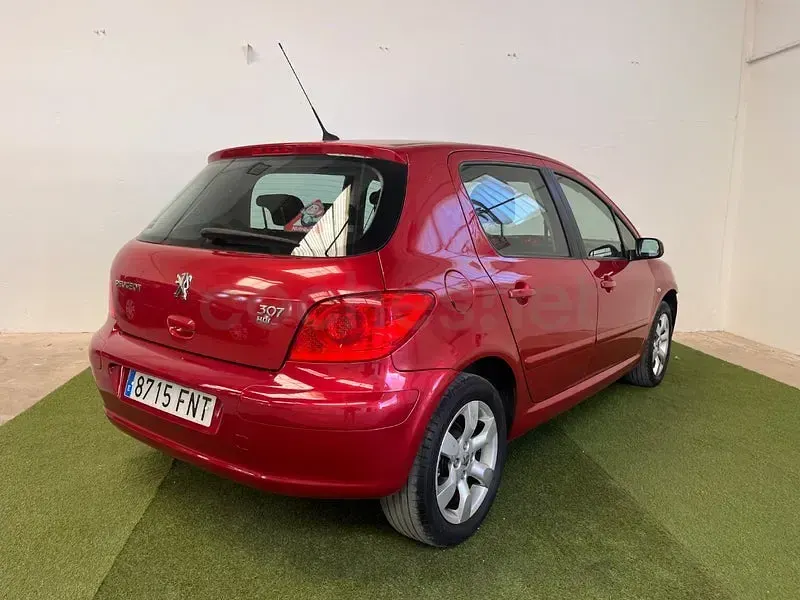 Usado Peugeot 307 110 CV (80 kW) 2007 Granate Berlina