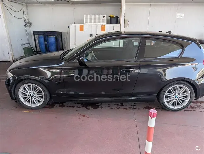 Usado BMW 118 143 CV (105 kW) 2009 Negro Utilitario