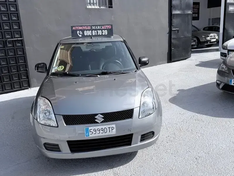 Usado Suzuki Swift GLX 92 CV (67 kW) 2005 Gris / plata Utilitario
