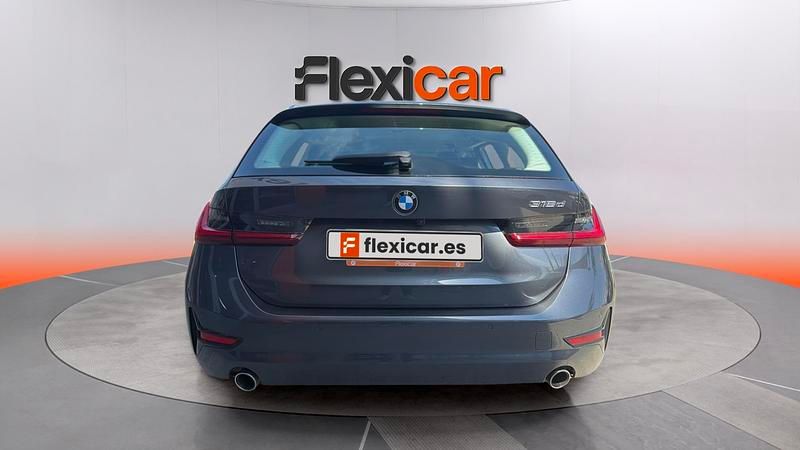 Usado BMW 320 184 CV (135 kW) 2022 Negro Familiar