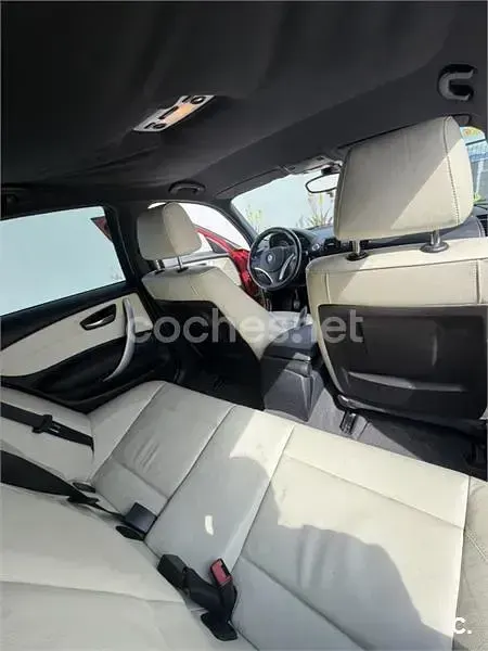 Usado BMW 118 122 CV (89 kW) 2008 Rojo Utilitario