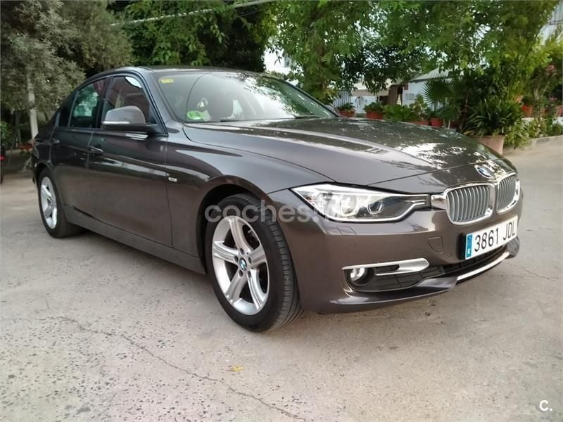 Marrón Usado 2015 BMW 318 Comfort Edition Berlina | 11.900 € (Buen precio) - Imagen 1/4
