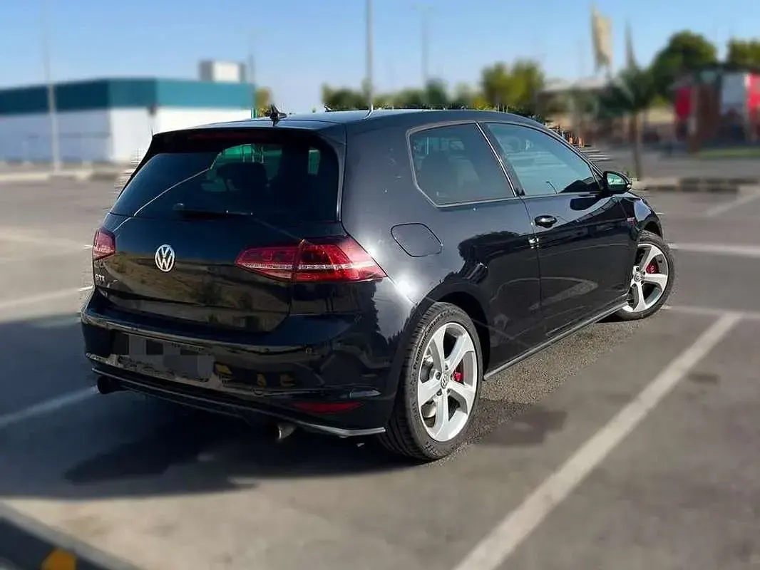 Usado VW Golf VII GTI 230 CV (169 kW) 2013 Negro Utilitario