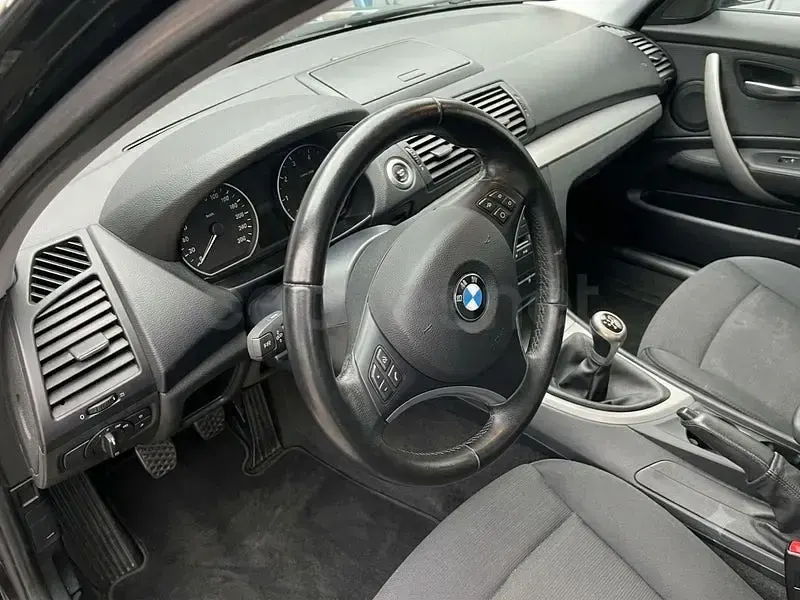 Usado BMW 116 122 CV (89 kW) 2008 Negro Utilitario