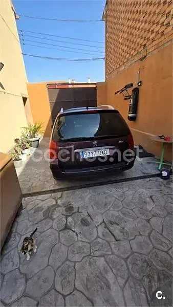 Usado Peugeot 307 110 CV (80 kW) 2006 Granate Familiar