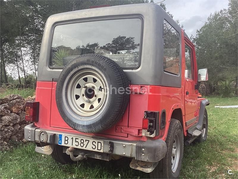 Usado Asia Motors Rocsta 72 CV (52 kW) 1996 Granate Familiar